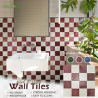 Burgundy check self-adhesive tiles on a bathroom wall behind a white washbasin